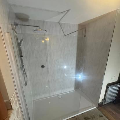 Walk-in Mira shower installation in a Holsworthy bathroom